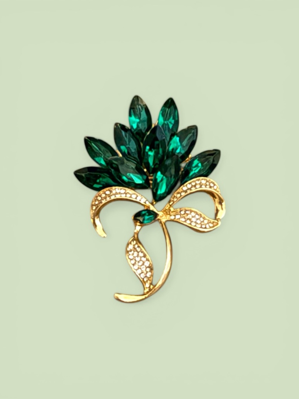 Emerald Green Crystal Ribbon Brooch in Gold Tone